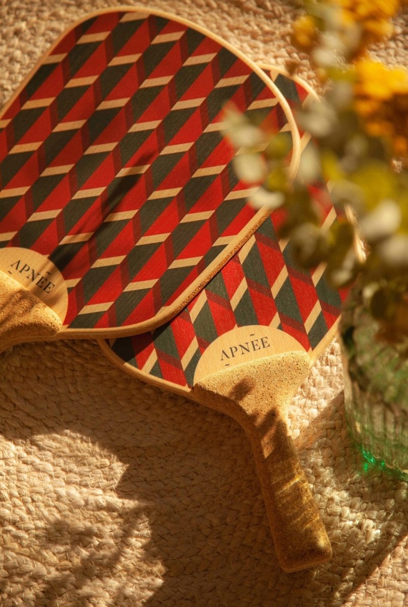 raquette de plage motif rouge